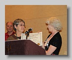 115  Carol Ann Bonner receiving her Award of Appreciation from Arleen Dewell  [JMH]